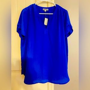 Short sleeve blouse with tag